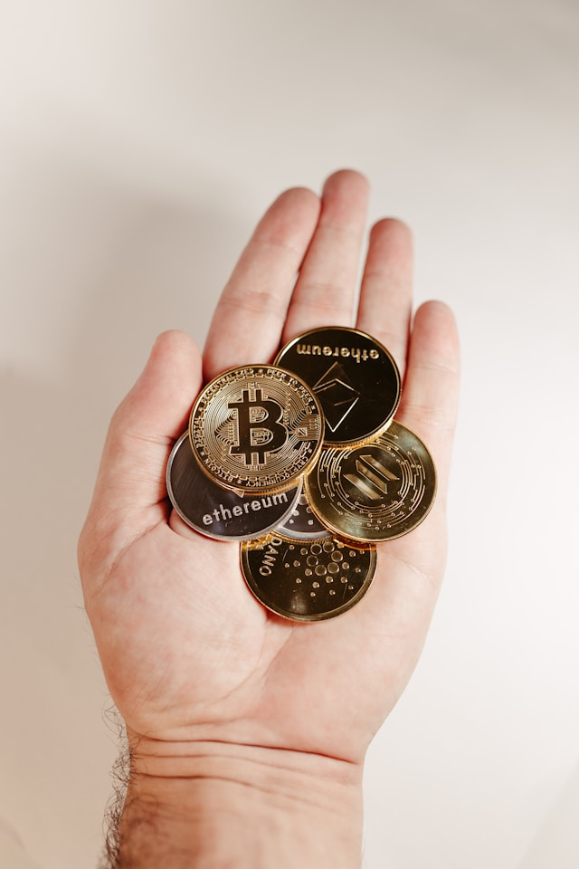 hand with crypto coins