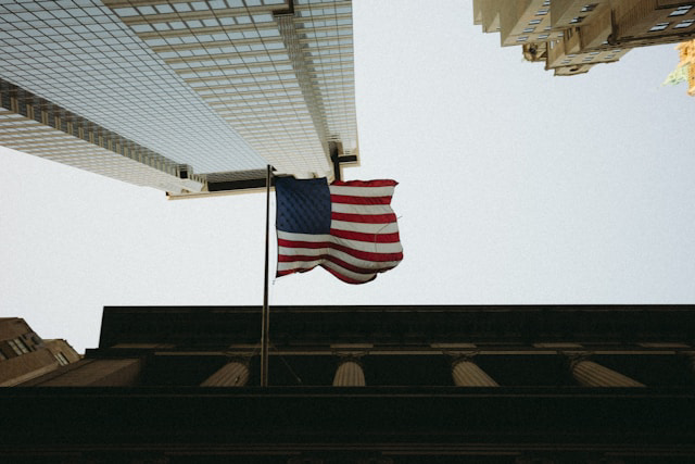 usa flag over wall street