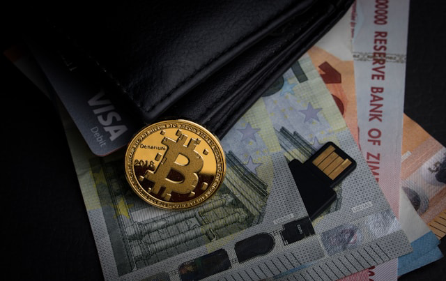 bitcoin on banknotes with wallet