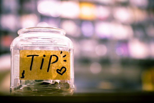 Clear glass jar labeled tips
